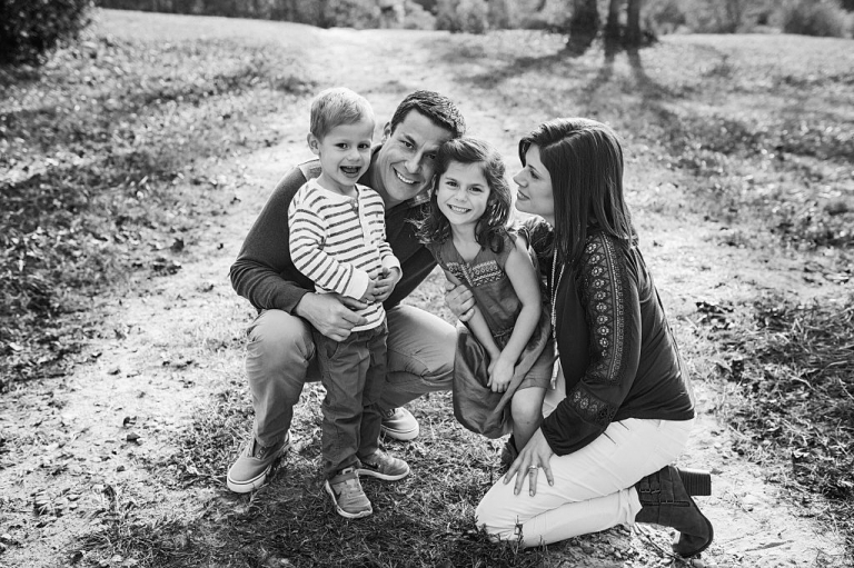 black and white family of four portrait