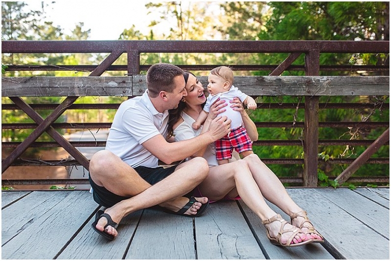 parents looking sweetly at baby boy