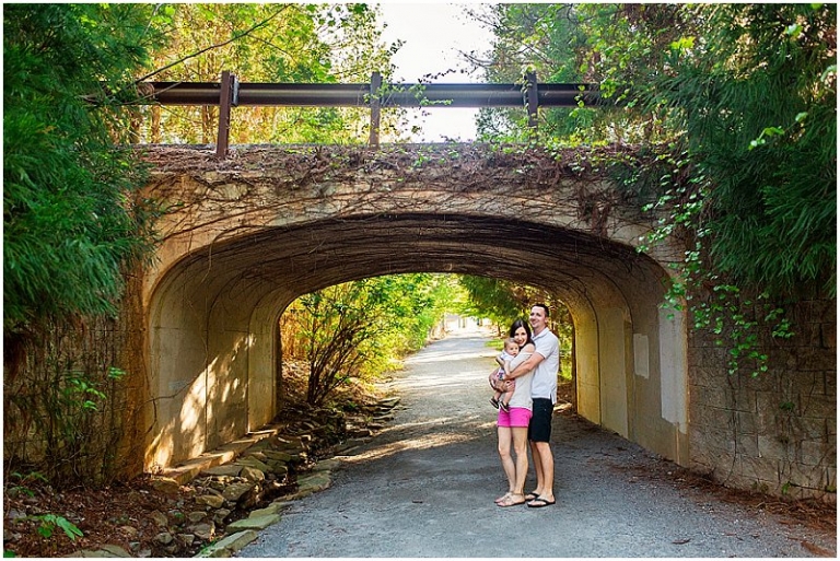 family portrait under bridge