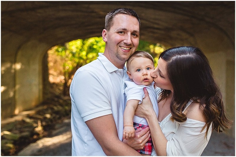 mom kissing son on cheek 