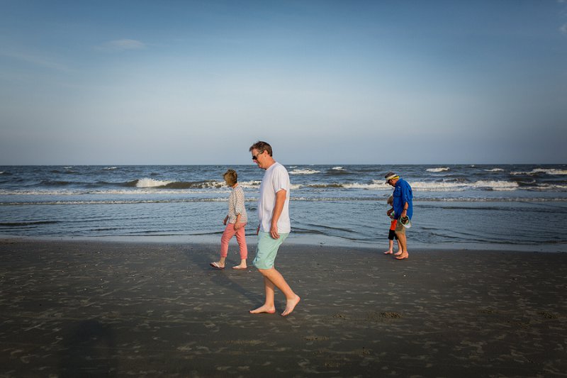 Wild Dunes-Isle of Palms family walking on the beach at sundown