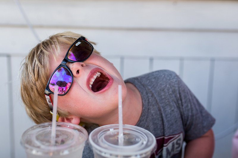 Poe's Sullivan's Island little boy singing into his microphone
