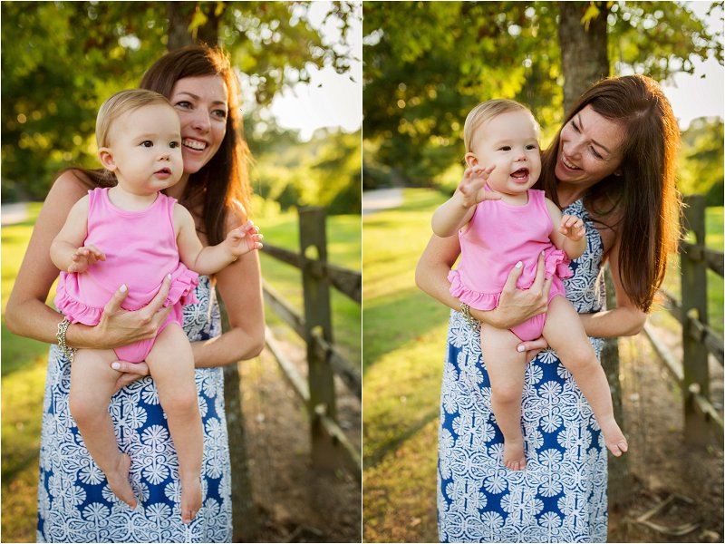 mom smiling at baby girl