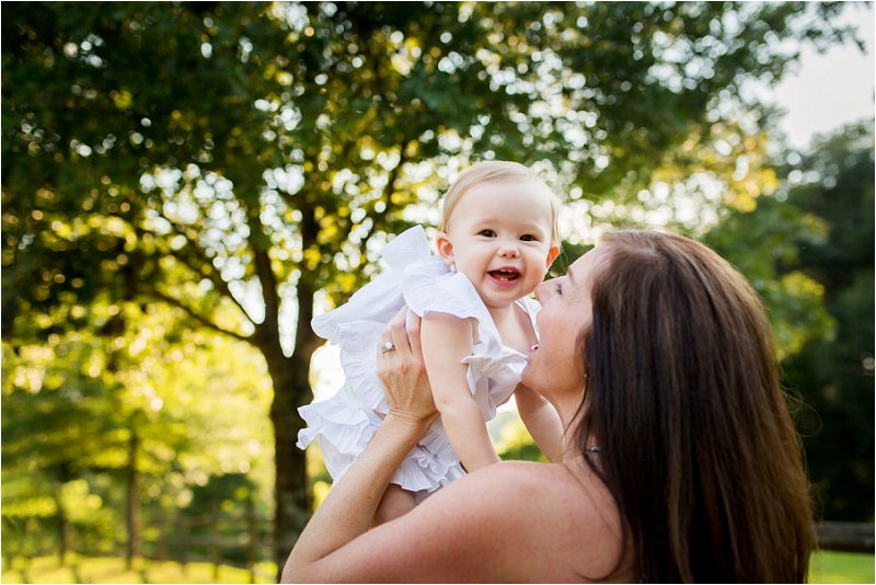 one year old girl smiling 
