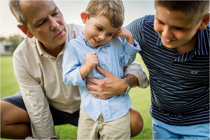dad and sons being silly