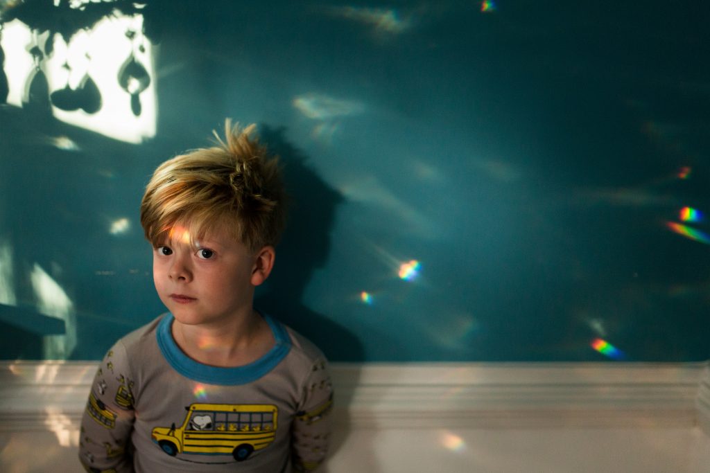 Atlanta - Marietta - Child - Photographer photographing a child in rainbow shadows wearing Hanna Andersson pajamas
