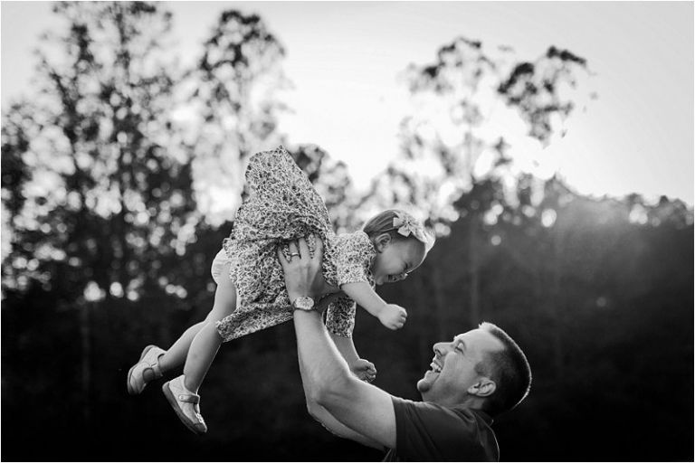 little girl flying through the air