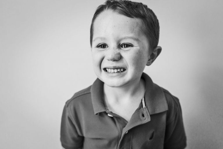 black and white photo series of the faces of childhood