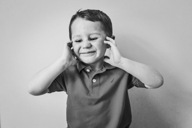 black and white photo series of the faces of childhood