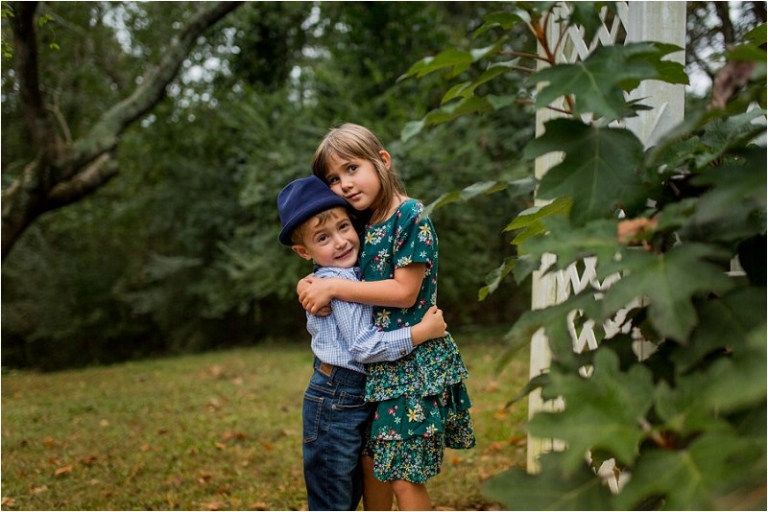 brother and sister embrace