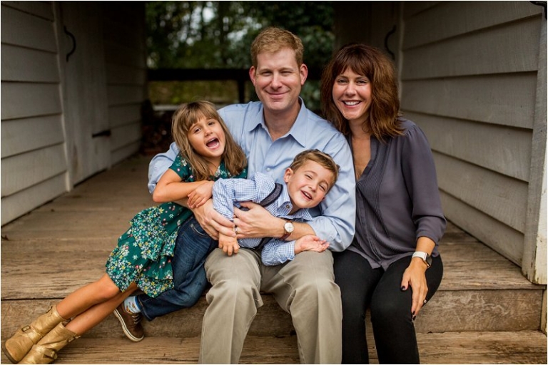 family posing for holiday card photo