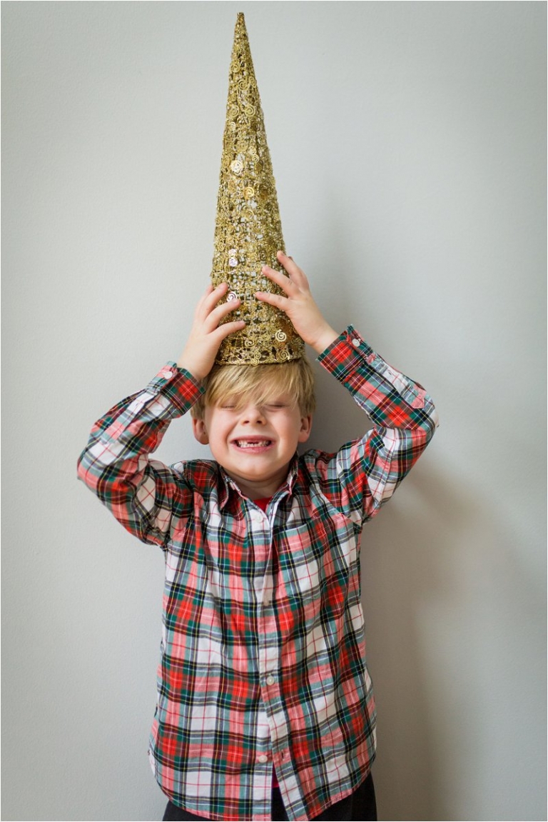 Kid with christmas decorations on his head