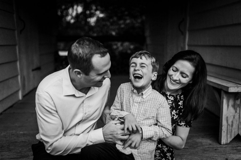 black and white image of family smiling