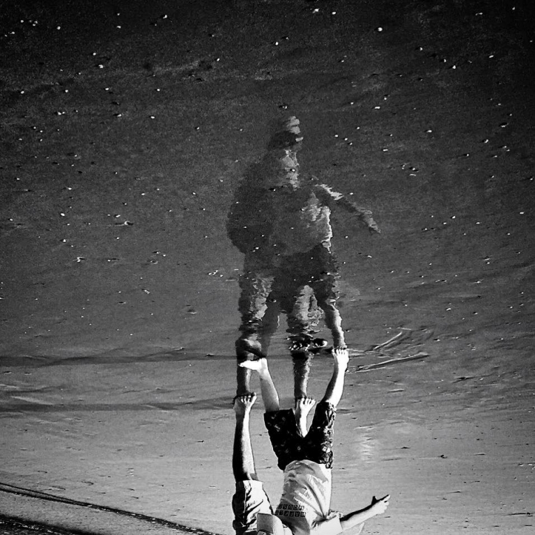 reflections in the surf
