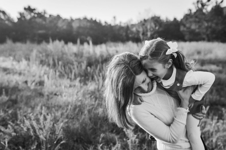 b&w picture of mom and daughter