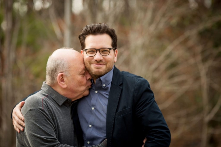 father in law hugging son in law