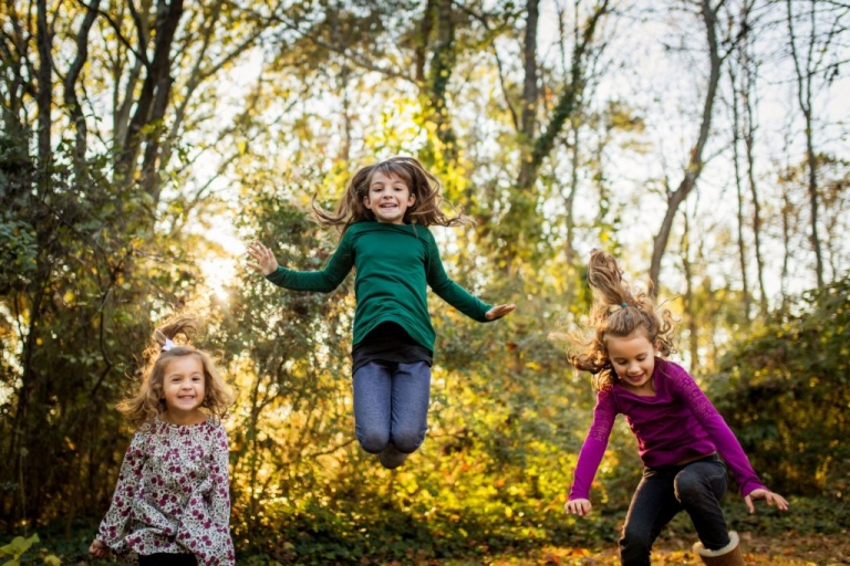little girls jumping