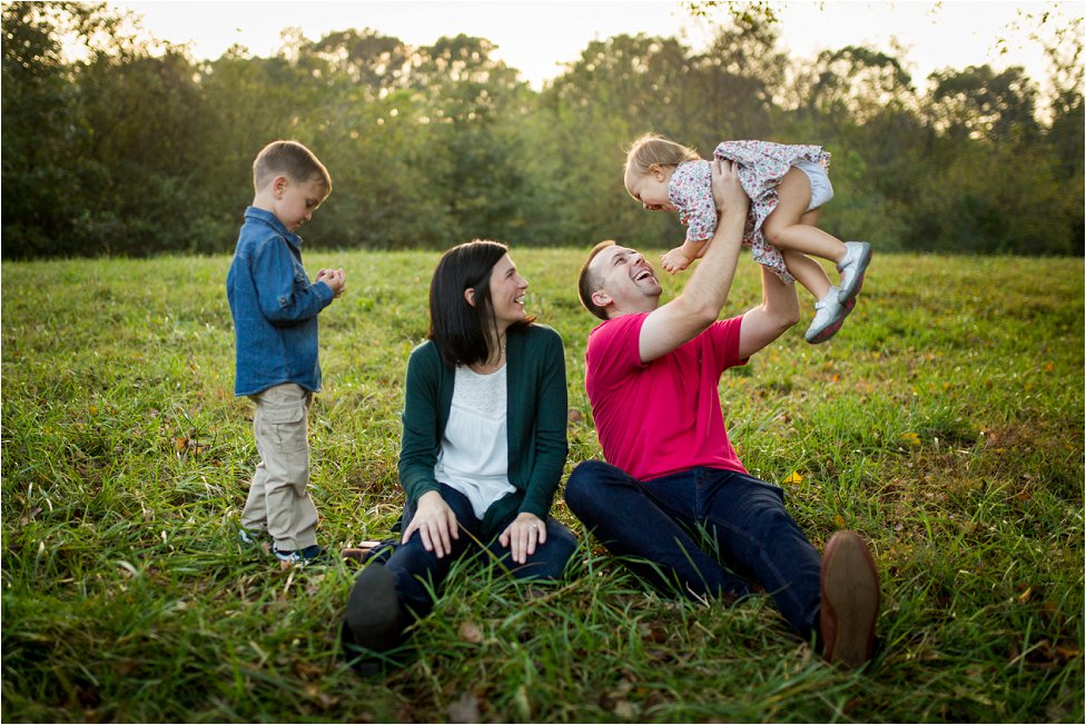 Loving and playful family during their golden hour portrait session