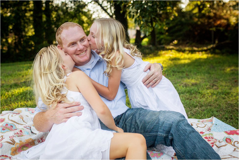 Katie Oblinger Photography _Outdoor Family Photography in Marietta little girls kissing their dad on the cheek