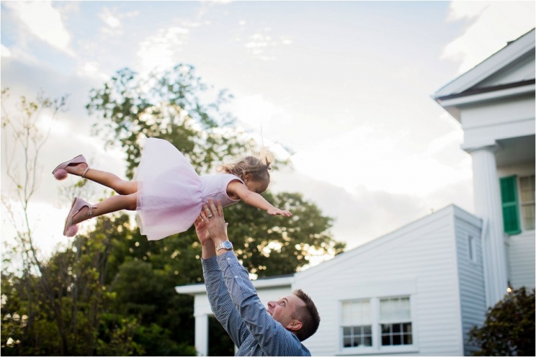 daddy throwing daughter in the air