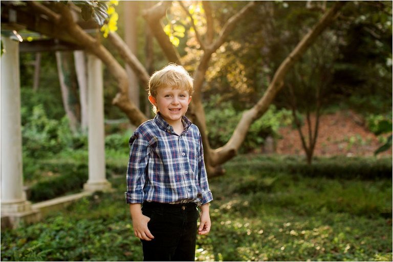 cute little boy standing for his picture