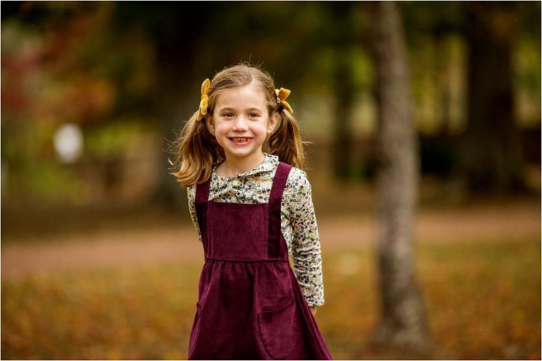 little girl chewing gum