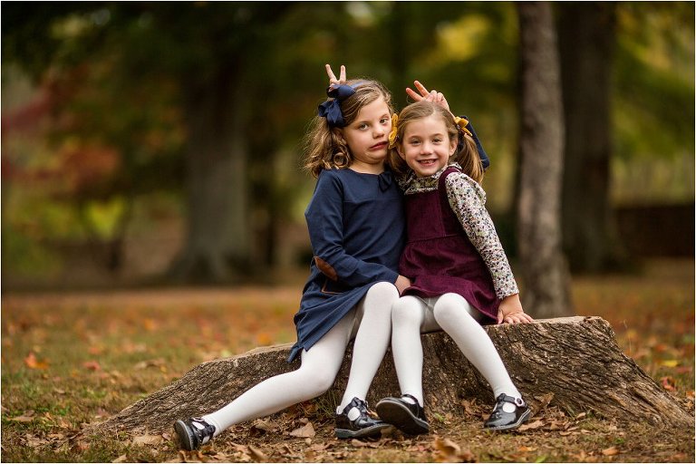sisters doing bunny ears in Roswell, GA