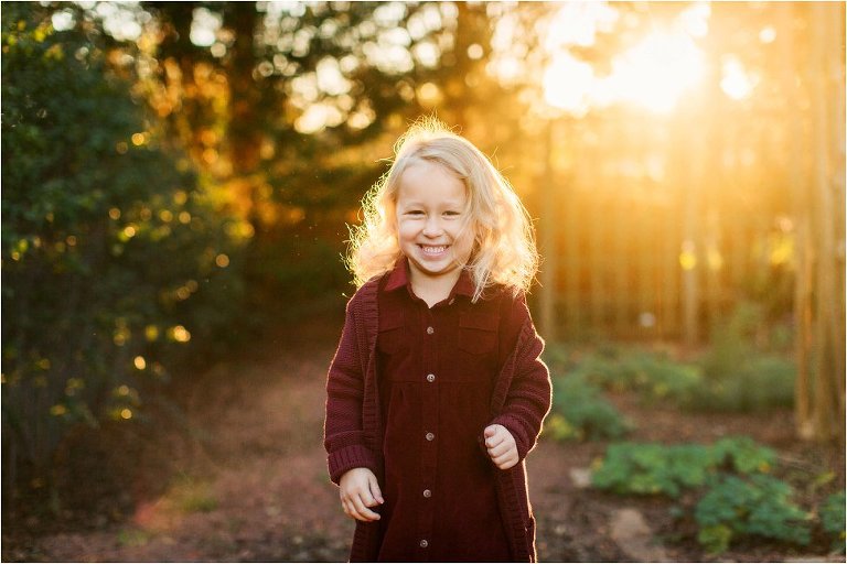 precious blonde girl at sunrise