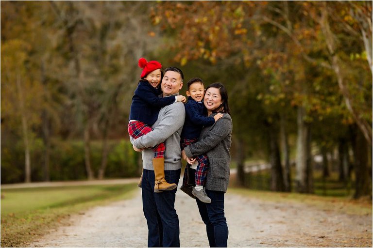 Beautiful family photo among warm fall foliage backdrop in Vinings, Atlanta.
