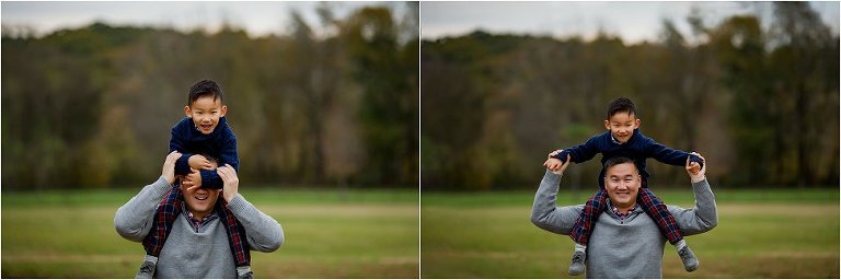 Little boy on dad's shoulders.