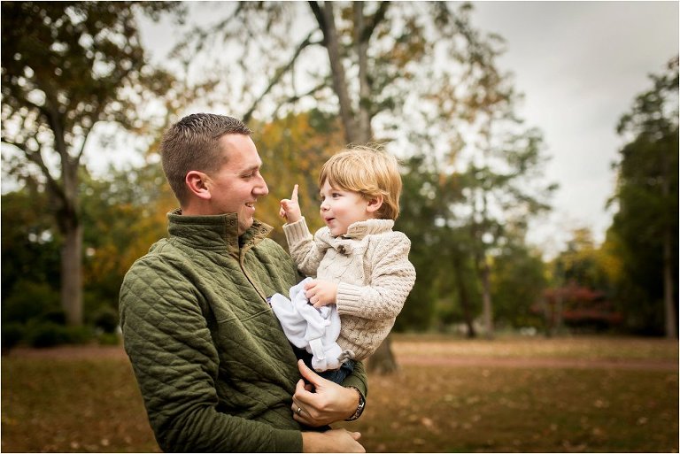 little boy wagging his finger at is daddy