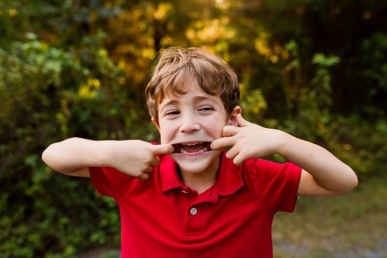 little boy making a silly face