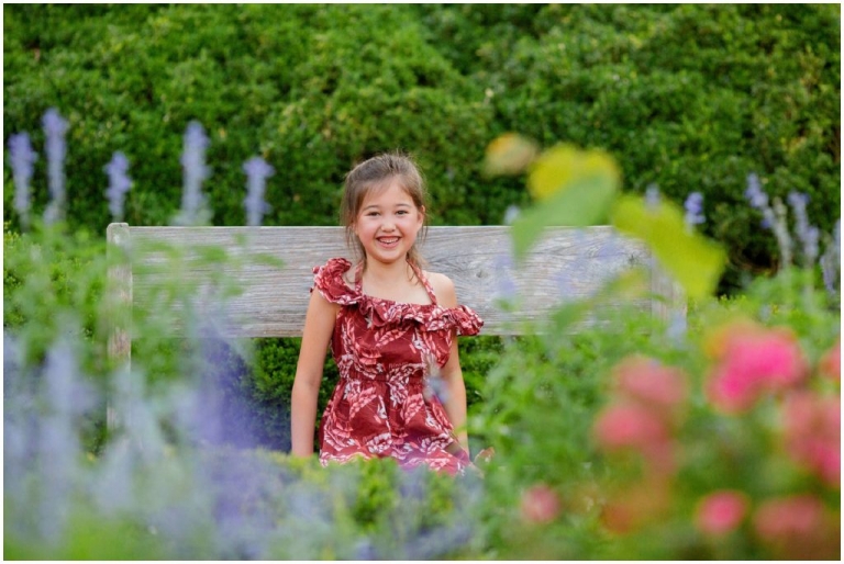Little girl smiling for the camera.